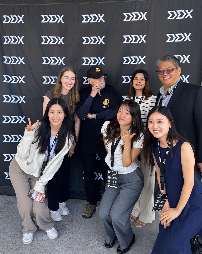 with fellow attendees at the DDX conference